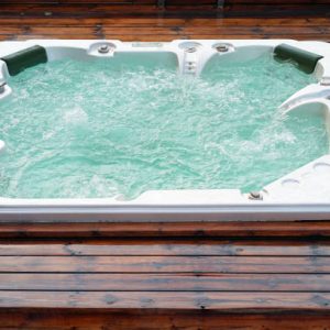 Pool cleaner during his work. Hot Tub.